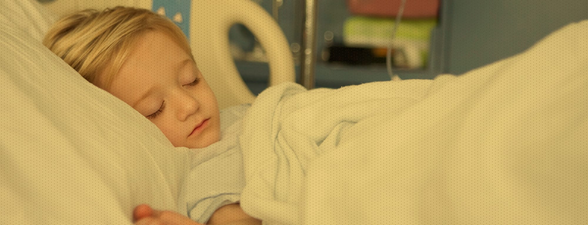 Young girl resting in hospital bed