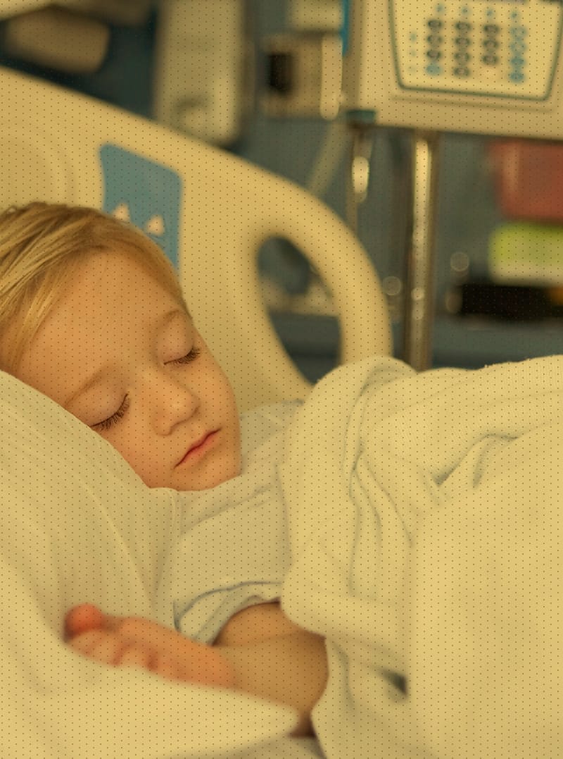 Young girl resting in hospital bed